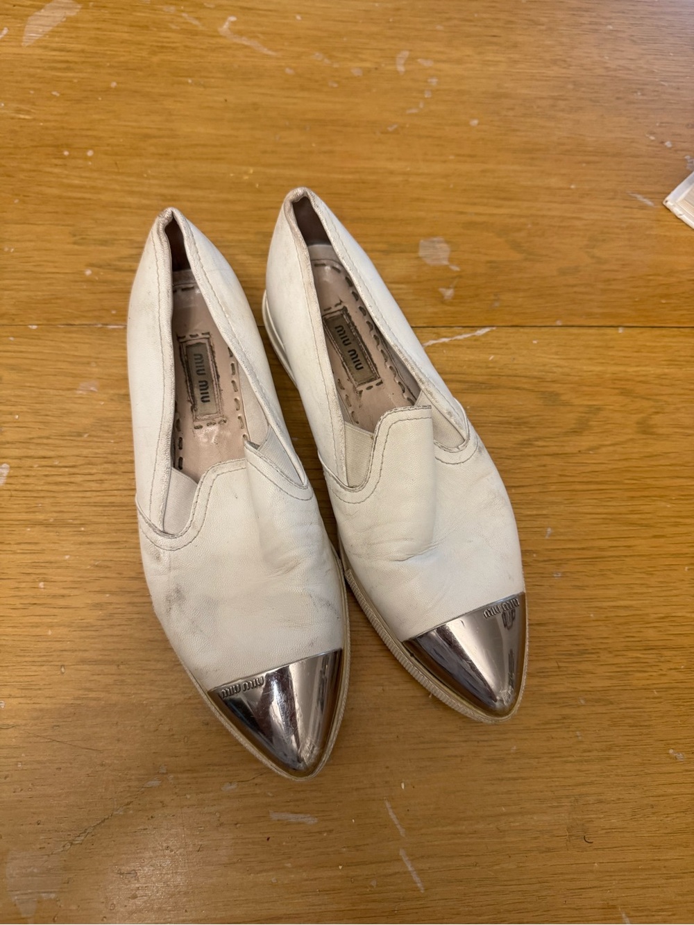 Miu Miu White Leather Slip-On Loafers with Silver Cap Toe
